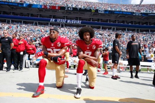 reid and colin-kaepernick kneeling